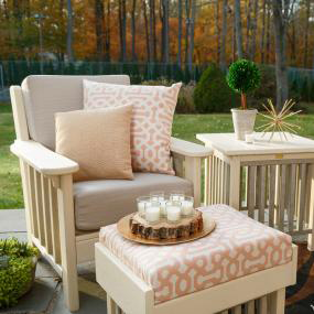 Chair With Pillows and a Table